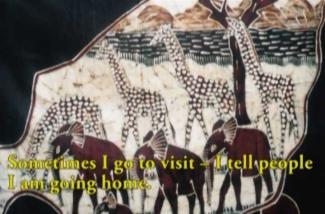 A craftwork showing  elephants and giraffes.