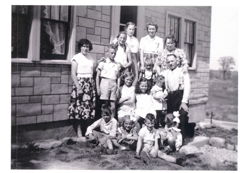 Grunthal family at their first home in Canada, 1953. Canadian Museum of Immigration at Pier 21 (DI2013.1672.6).