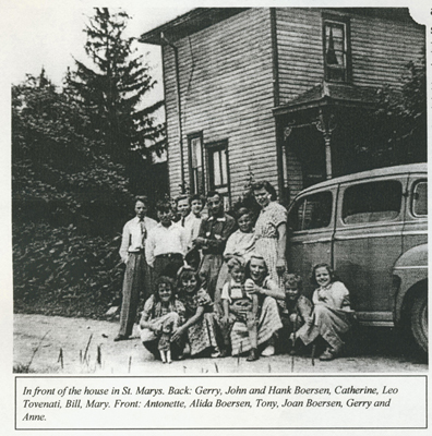 Lane family in front of house in St. Mary’s, Ontario. Canadian Museum of Immigration at Pier 21 (DI2013.1674.19).