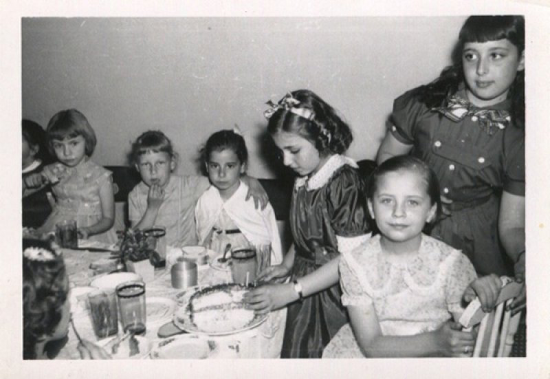 Gabby Nilof's 10th birthday, with Bow in Montreal, April, 1958. Canadian Museum of Immigration at Pier 21. (DI2013.1348.1)