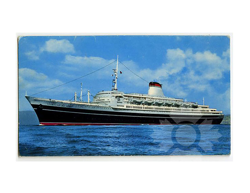 Colour photograph of TS Leonardo da Vinci at sea, broadside from port, with a bright blue sky behind.