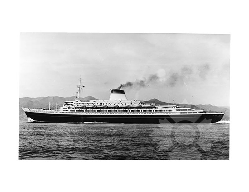 Black and white image of TS Leonardo da Vinci at sea, broadside from port, single funnel smoking.