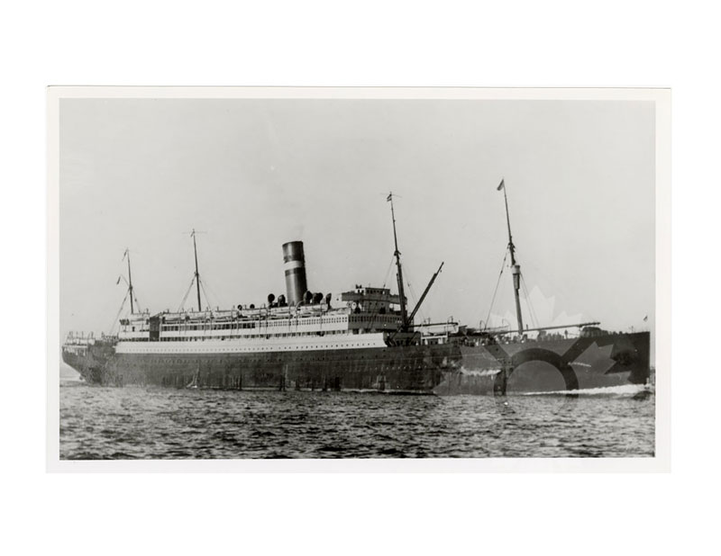 Black and white image of SS Nieuw Amsterdam I at sea, broadside from port, single funnel and multiple masts visible.