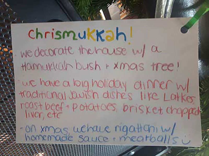 A message about Christmas written with multi-color markers.