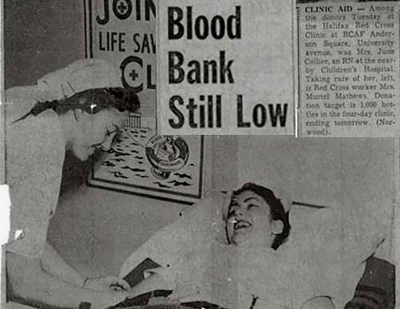 An old newspaper article with the headline Blood Bank Still Low, shows a nurse drawing blood from a reclining woman.
