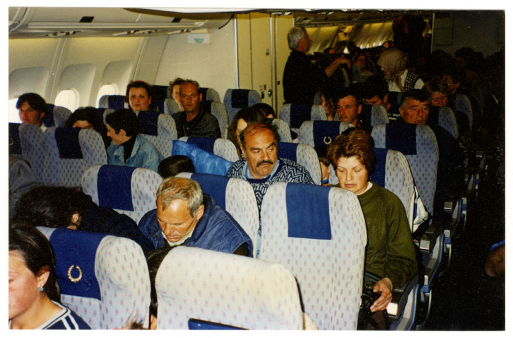 A group shot of airline passengers.