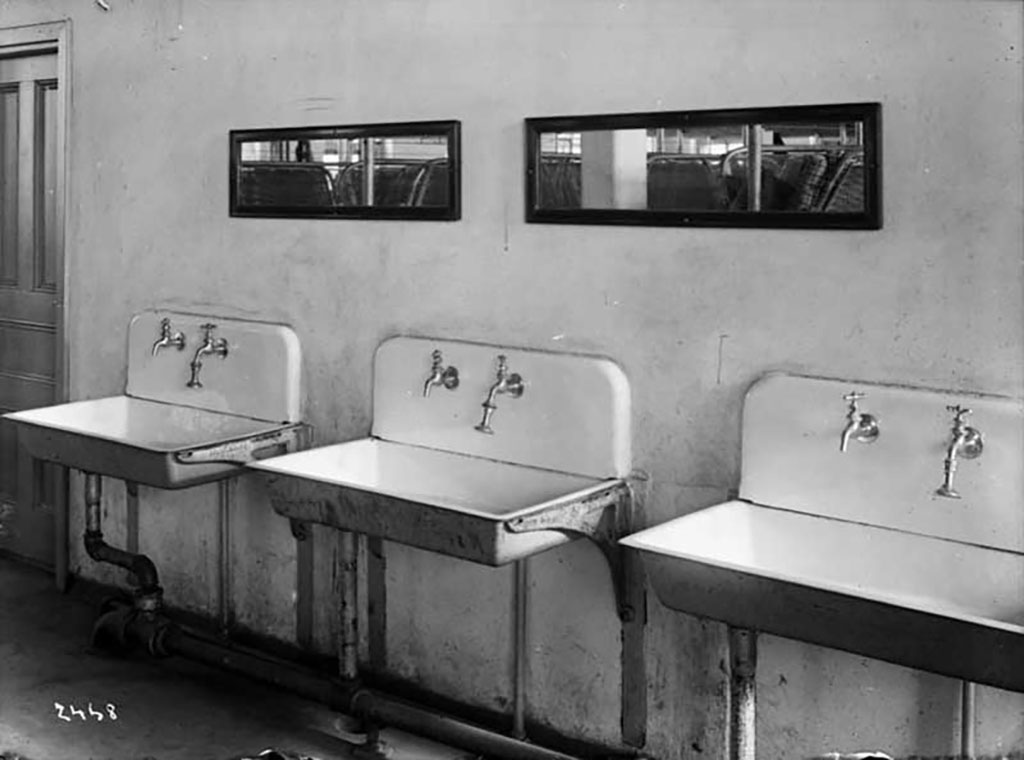 Wash basins in men’s dormitory.