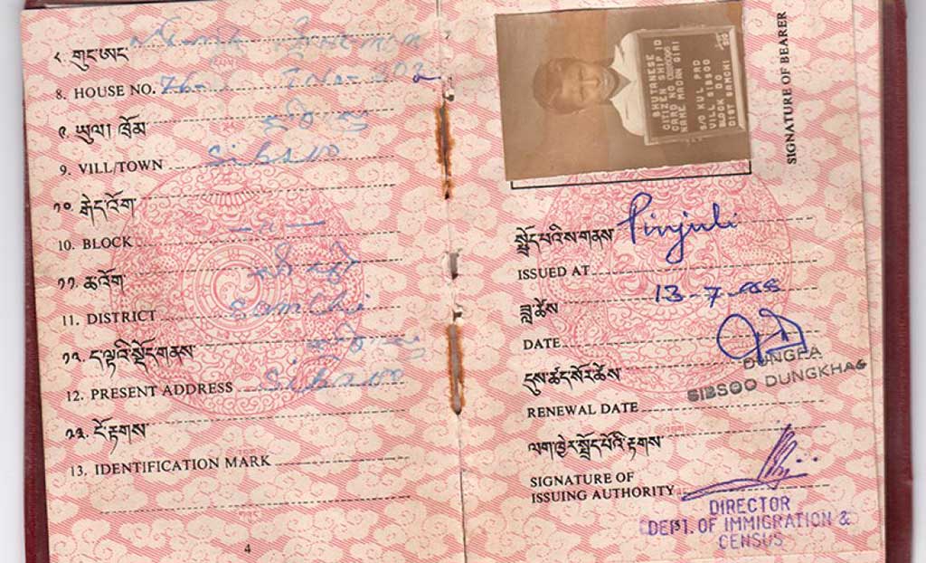 Passport opened up to the photo and details pages.