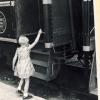 Helen Meyer child boarding a train at the Canadian National Railway station in Halifax, NS. Canadian Museum of Immigration at Pier 21 (DI2013.1558.18).