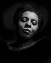 A portrait of Portia White by Yousef Karsh.