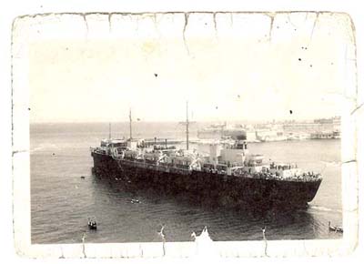Old, wrinkled photo of an aerial shot of ship "Marine Perch".