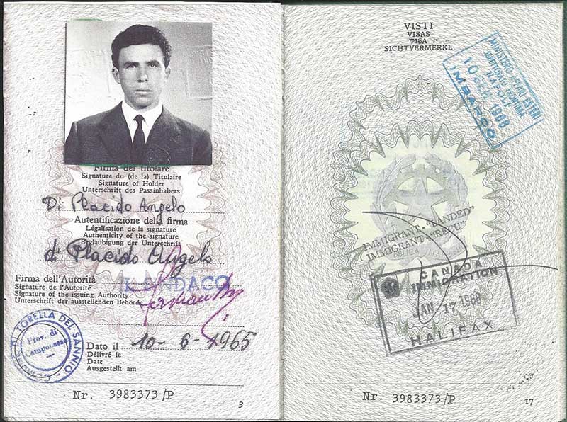 Old passport showing photo of young man.