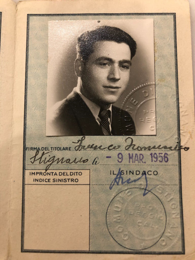 Passport page with photo of a young man.