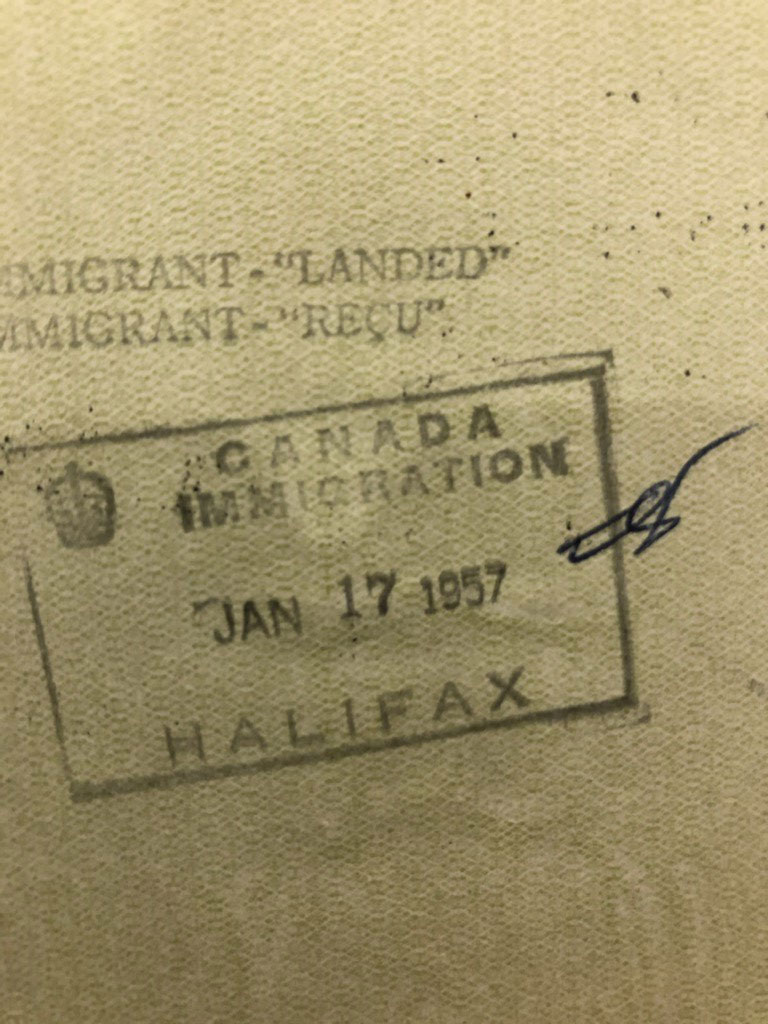 Passport page with Canadian Immigration stamp, dated January 17, 1957.