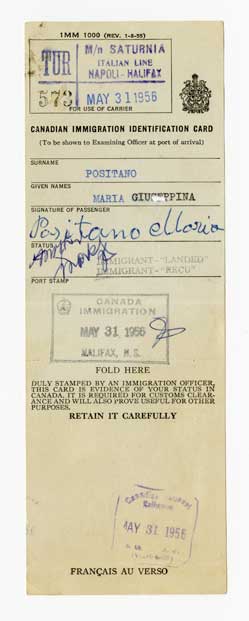 Canadian immigration identification card of Maria Positano with three stamps and a signature.