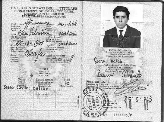 Old passport showing a photo of a young man.