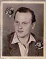 Older passport photo of younger Manfred.