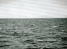 Photo of ocean as taken from deck of ship.