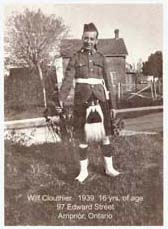 Young Wilfred standing in traditional Scottish dress.