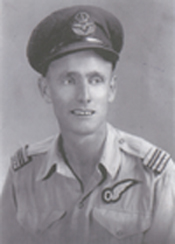 Portrait of young Bob, wearing his pilot’s uniform and a cap.
