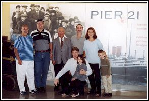 Older Gaetano, with various members of his family, visiting Pier 21 Museum.