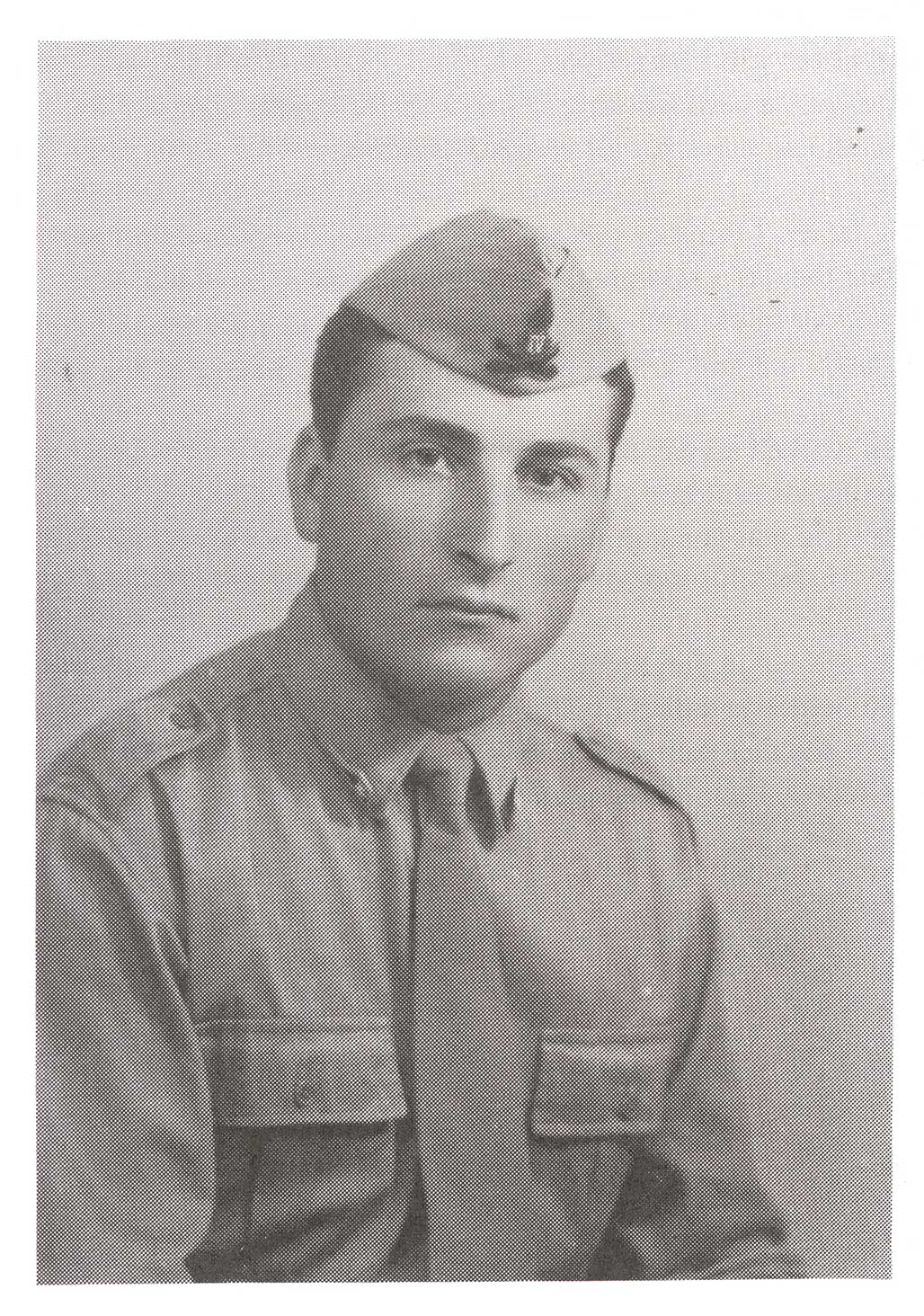 Military portrait of a young man in uniform.