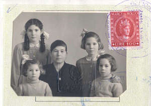 Family passport photograph of a woman and her four young daughters.