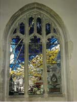 Colourful stained-glass window of a church.