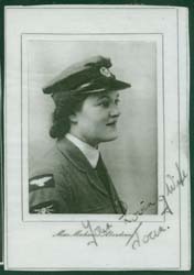 Framed profile image of Joan, young woman, wearing military attire. 