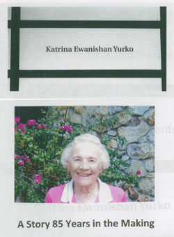Image of elderly Katrina, wearing pink, next to a plaque bearing her name.