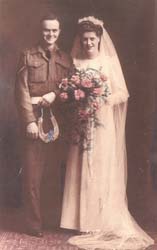 Old portrait of bride and groom on wedding day.