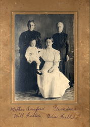 Portrait of seated woman in white holding baby, and two women in black standing behind.