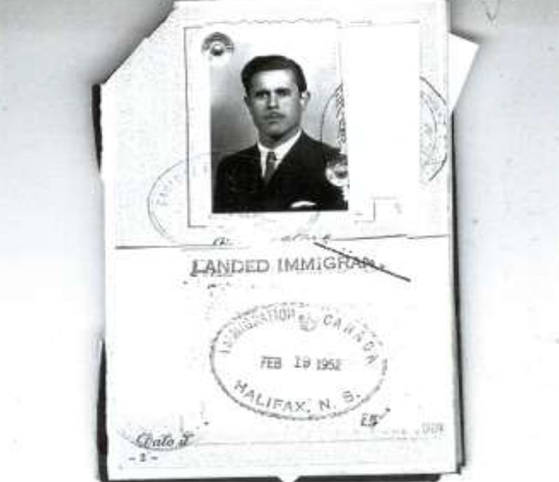 Old landed immigration papers showing stamps and a head shot.