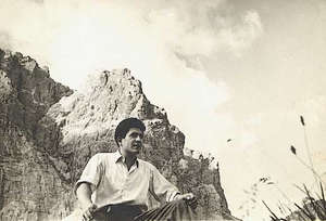 Young Leonardo sitting on the rocky hillside near his hometown.