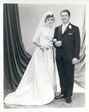 Black and white portrait of bride and groom on wedding day.