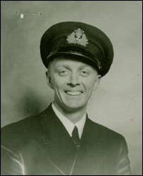 Young John in military uniform and cap. 