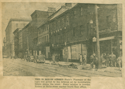 Old newspaper article showing damage to Hollis Street in Halifax.
