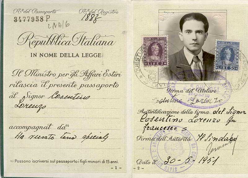 Old passport showing man's photo and Italian writing.