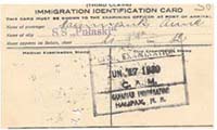 Immigration Identification Card with Canadian stamp on it.