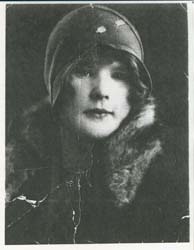 Photo of young Margaret, wearing a cap and fur-collared coat.