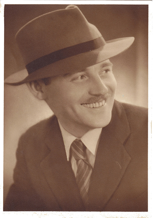 Facial portrait of a man wearing a hat that was the fashion in 1950.
