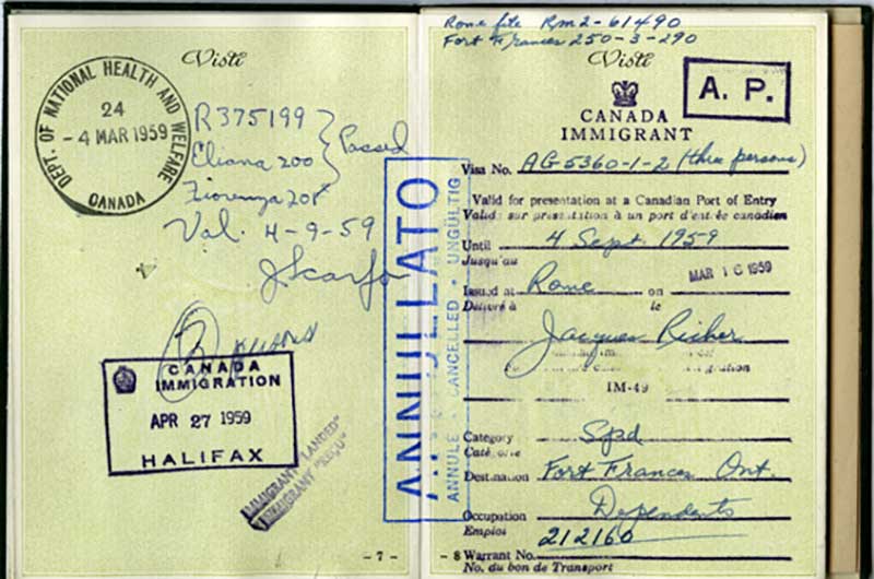 Old Canada Immigrant card, showing stamped dates and information of the card holder.