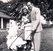 Young Ilse and Pino, pushing a baby stroller.