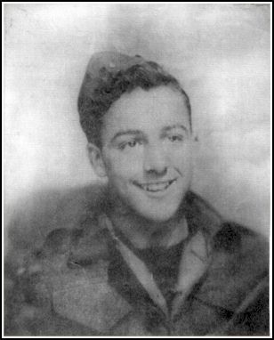 Portrait of young Albert smiling, in uniform and cap.