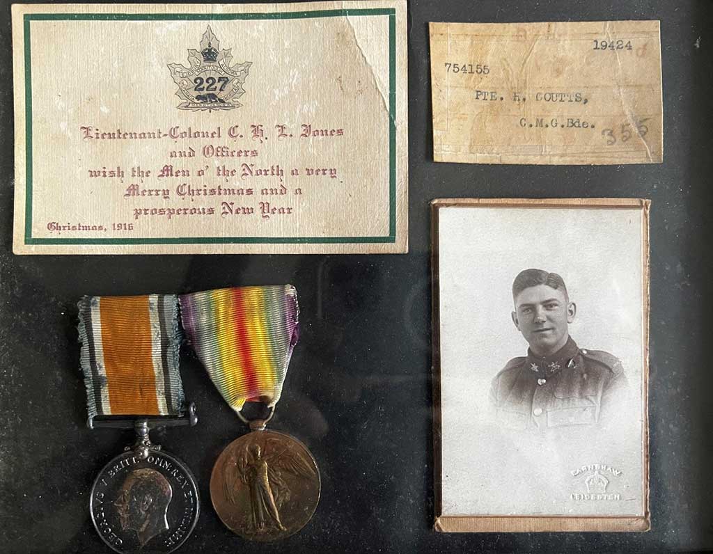 Medals and documents of young service man.