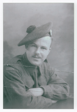 Serving portrait of young Lawrence in uniform and cap. 