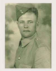 Portrait of younger Thomas in his service uniform and cap.