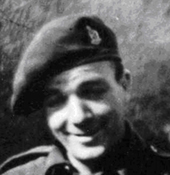 Black and white photo of young Charles wearing his military beret.
