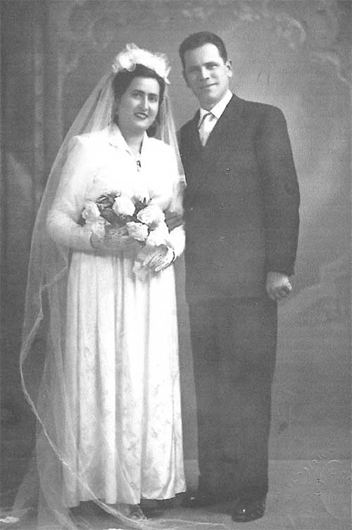 Old portrait of bride and groom on their wedding day.