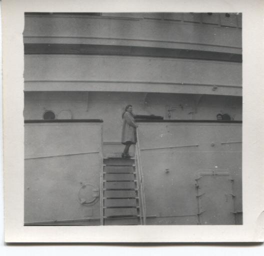 Woman on deck of ship.